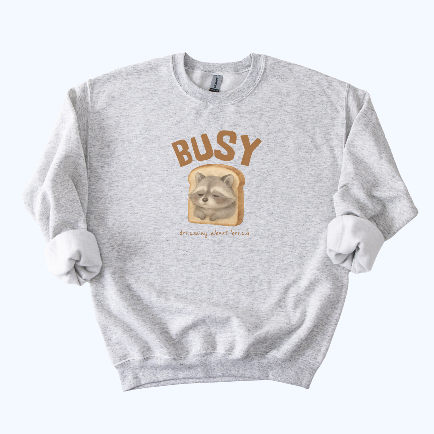 Raccoon “Busy… Dreaming About Bread” Crewneck Sweatshirt