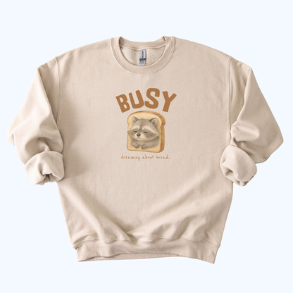 Raccoon “Busy… Dreaming About Bread” Crewneck Sweatshirt